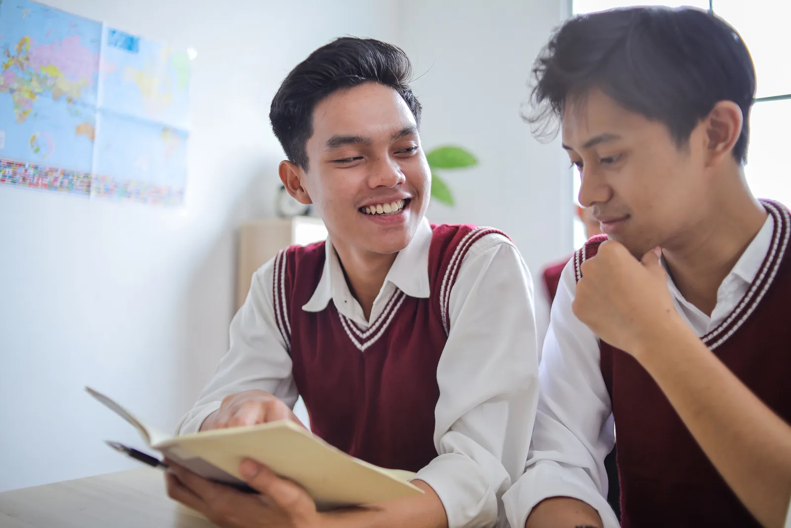 Two secondary students working together on a classroom task