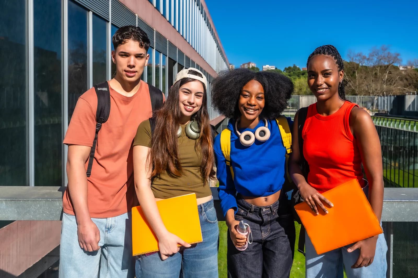 A diverse group of older students meeting on a college campus