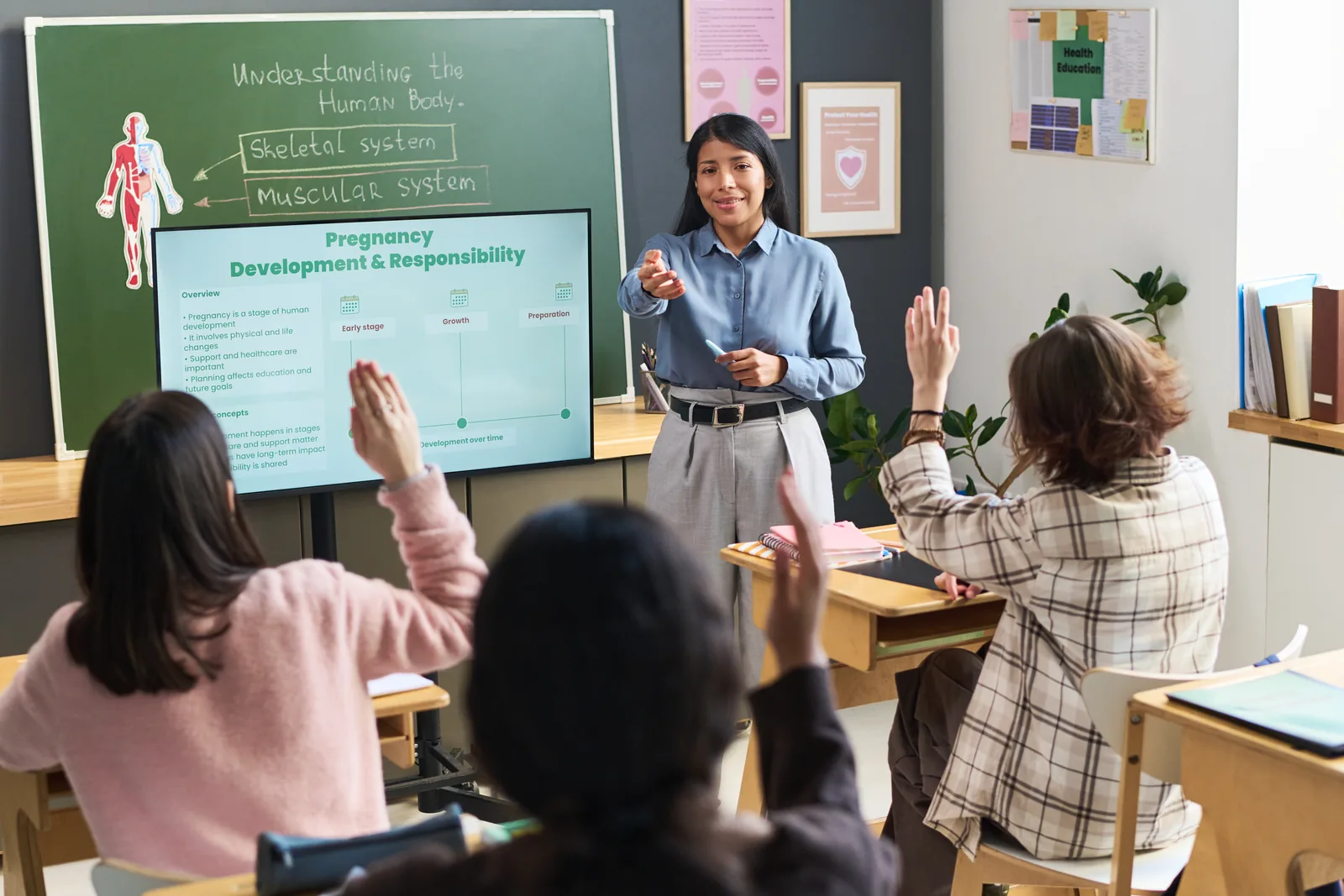 High school teacher leading a health class with students
